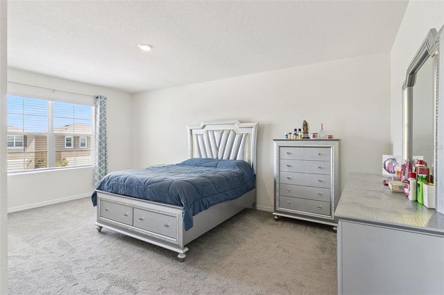 Furnished interior view inside a new home in Harmony at Lake Eloise, Winter Haven (Image 17).