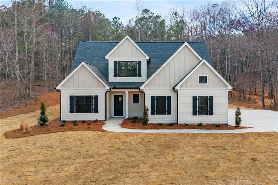 Front exterior of a new home in , Carrollton, GA, highlighting curb appeal (Image 24).