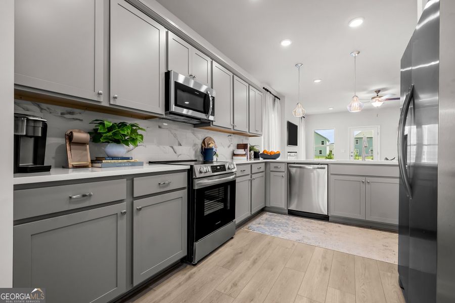 Furnished interior view inside a new home in Cobblestone Crossing Commons, Warner Robins (Image 8).
