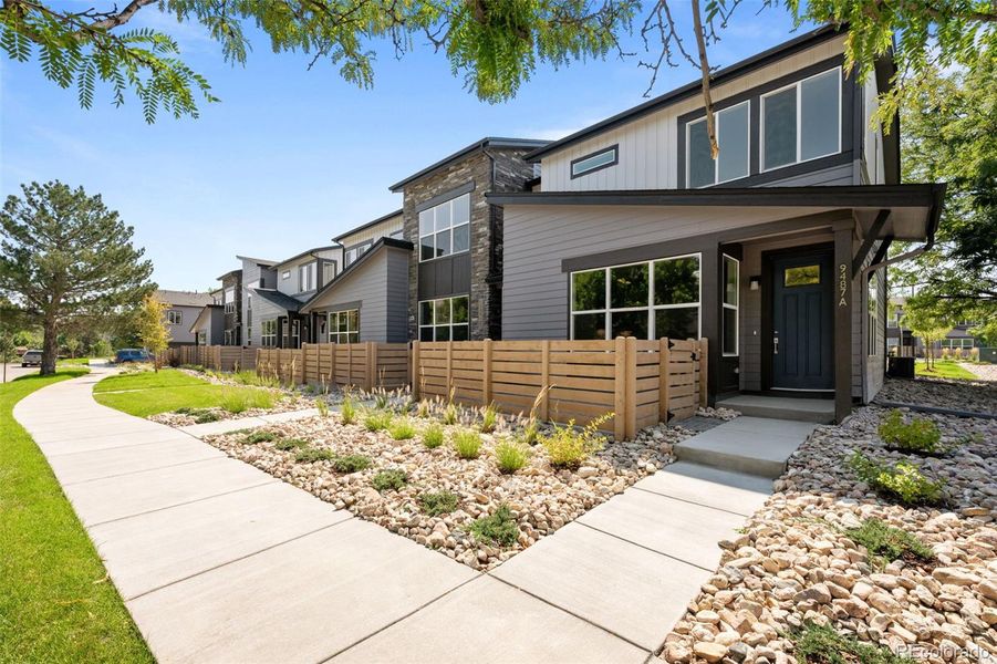 Front exterior of a new home in Ralston Creek, Arvada, CO, highlighting curb appeal (Image 1). Front exterior of a new home in Ralston Creek, Arvada, CO, highlighting curb appeal (Image 1).
