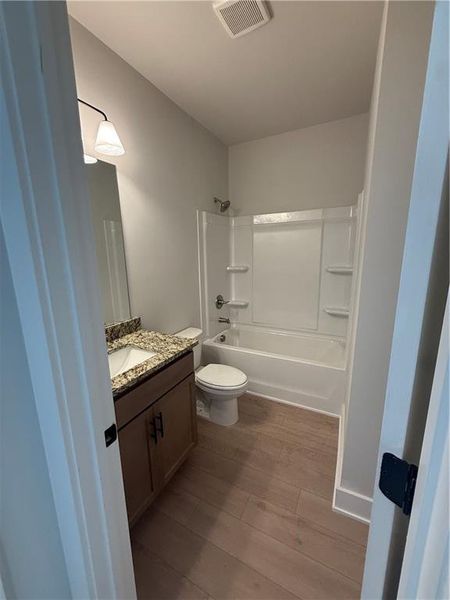 Furnished interior view inside a new home in The Fairways at Mirror Lake, Villa Rica (Image 5).