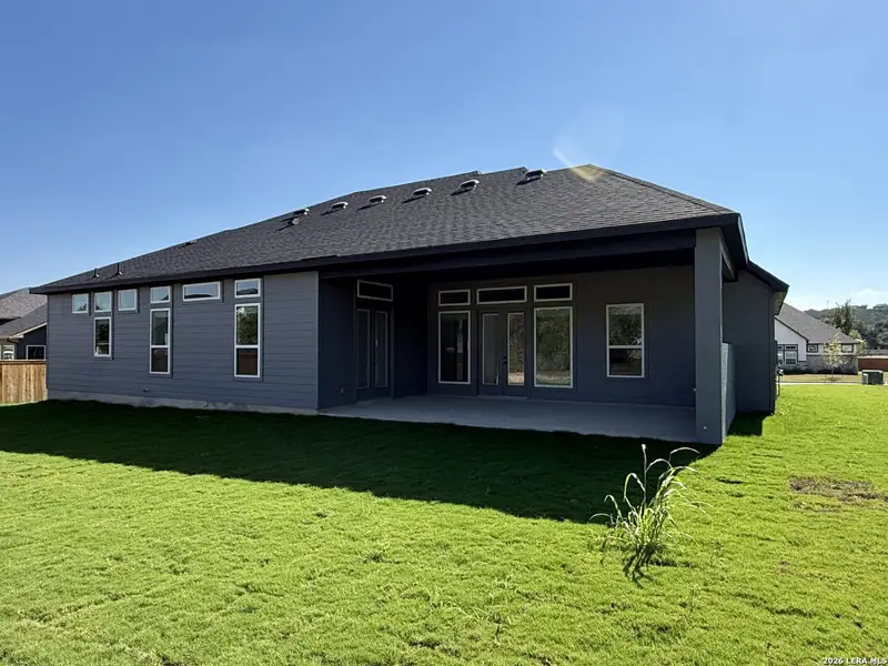 Exterior details and patio area of a home in , Castroville (Image 3).