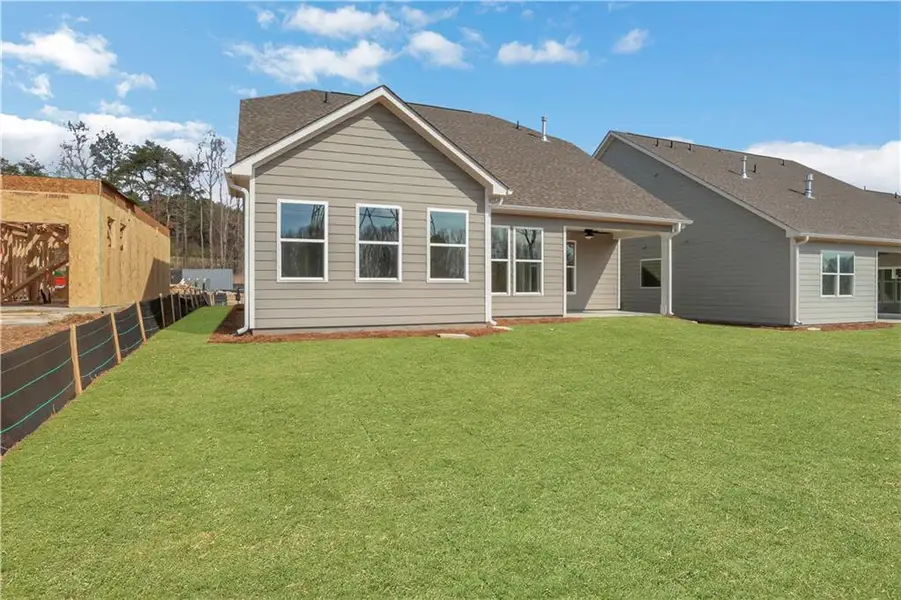 Exterior details and patio area of a home in Marble Tree, Ball Ground (Image 4).