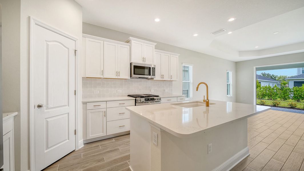 Furnished interior view inside a new home in Wildleaf at North River Ranch, Parrish (Image 10).
