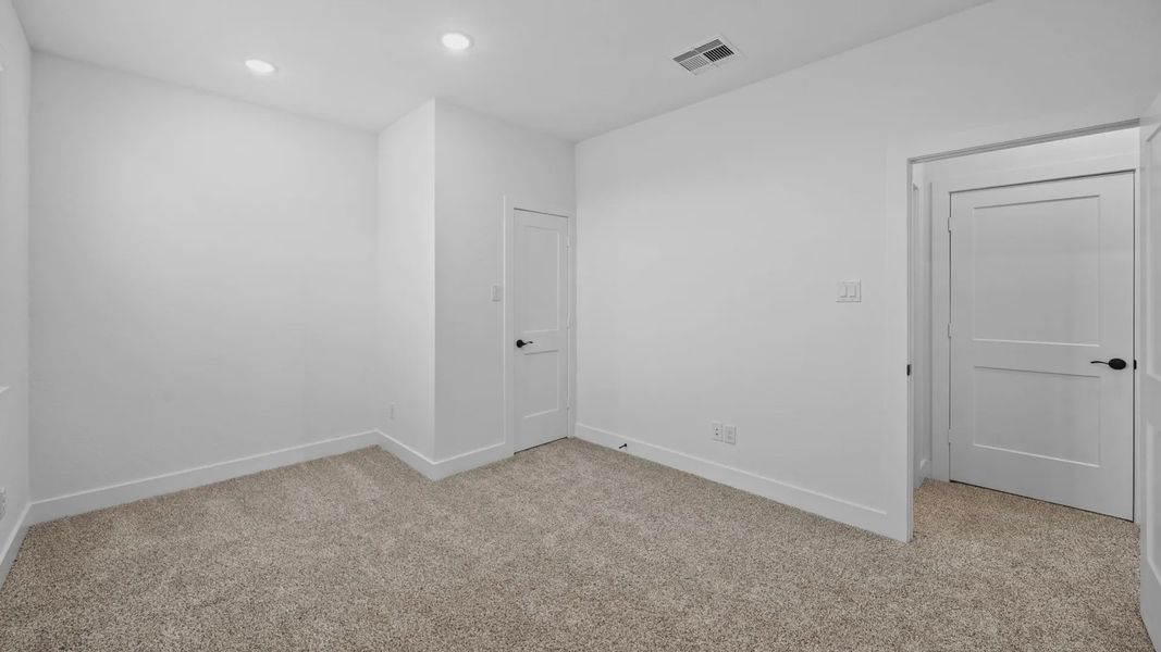 Representative unfurnished interior of a home built from the Rivers by Chesmar Homes in Sofi Lakes, Katy (Image 34).