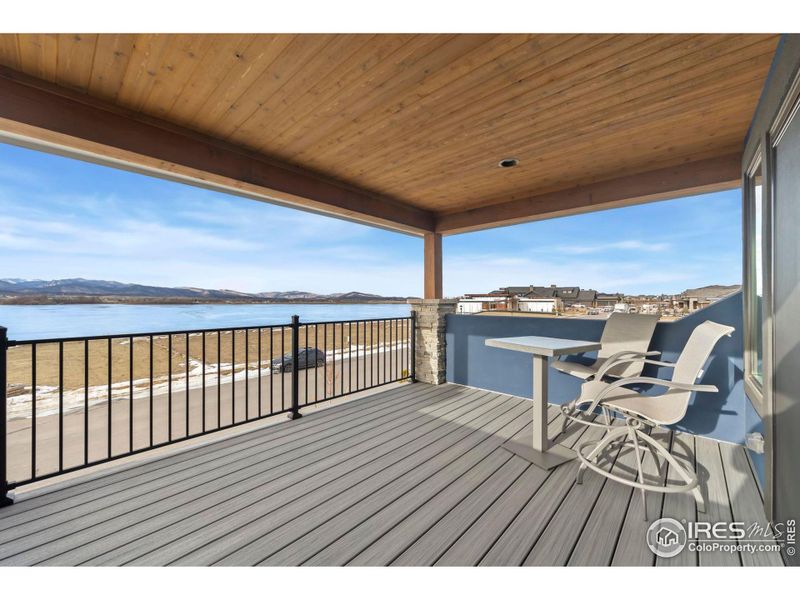 Deck off the loft study with views of mountains and Lonetree Reservoir