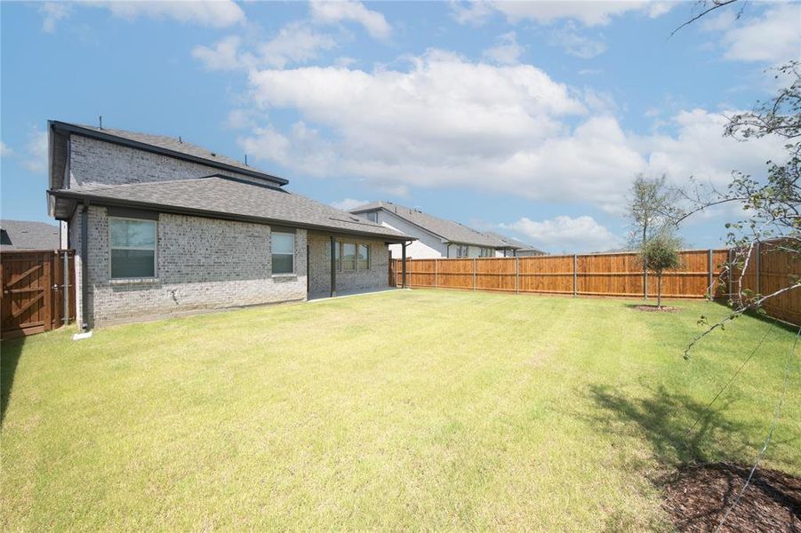 Front exterior of a new home in Lake Pointe: Lake Pointe at Paloma Creek, Little Elm, TX, highlighting curb appeal (Image 15). Front exterior of a new home in Lake Pointe: Lake Pointe at Paloma Creek, Little Elm, TX, highlighting curb appeal (Image 15).