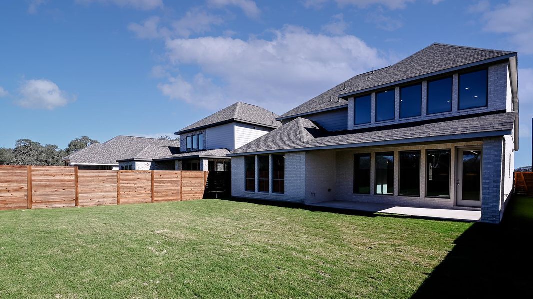 Exterior details and patio area of a home in Juniper Springs, Lockhart (Image 28).