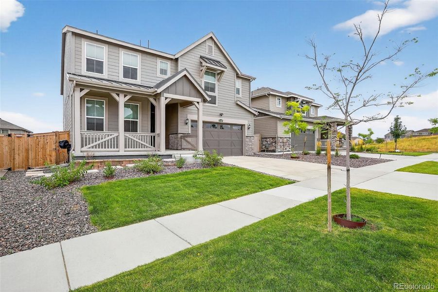 Front exterior of a new home in , Parker, CO, highlighting curb appeal (Image 19).