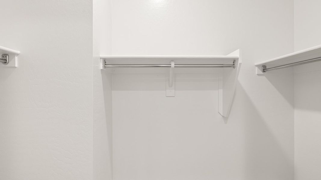 Representative unfurnished interior of a home built from the Crow by D.R. Horton in Apache Farms, Buckeye (Image 22).