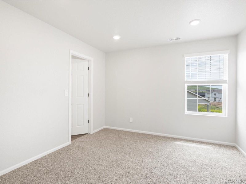 Spacious, unfurnished interior of a new home in Buffalo Highlands: The Canyon Collection, Commerce City (Image 22).