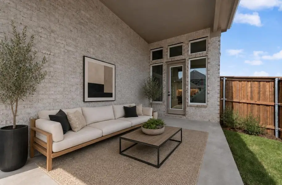 Exterior details and patio area of a home in Trails at Cottonwood Creek, Fate (Image 3).