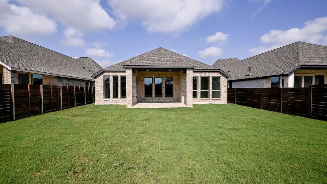 Exterior details and patio area of a home in Juniper Springs, Lockhart (Image 19).