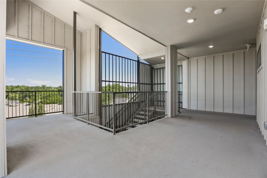 Exterior details and patio area of a home in East Grove Condominiums, Austin (Image 23).