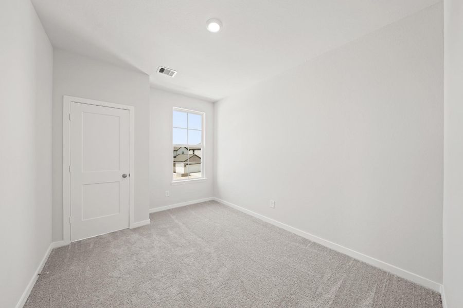 Spacious, unfurnished interior of a new home in Creekland Village at Bridgeland, Cypress (Image 22).