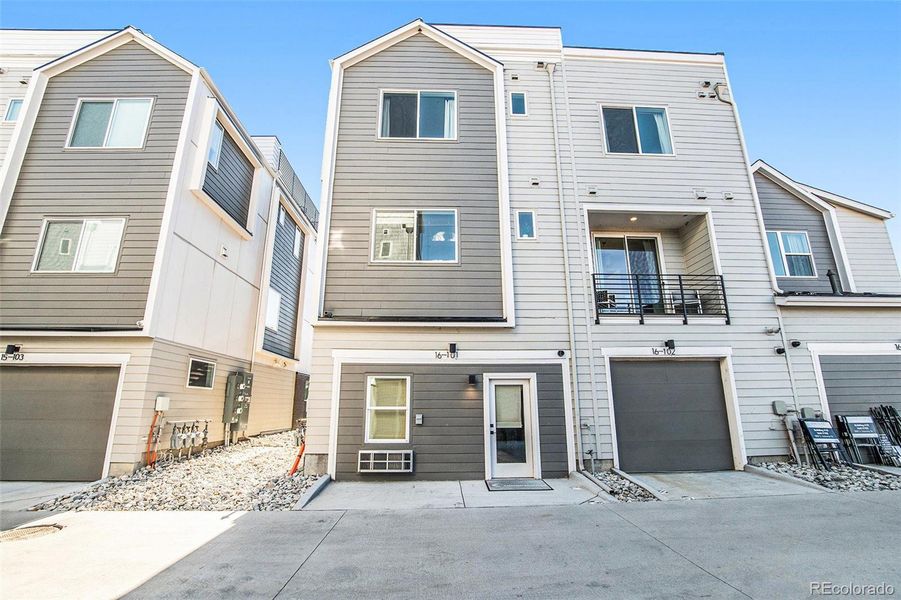 Front exterior of a new home in Prelude at TAVA Waters, Denver, CO, highlighting curb appeal (Image 2). Front exterior of a new home in Prelude at TAVA Waters, Denver, CO, highlighting curb appeal (Image 2).