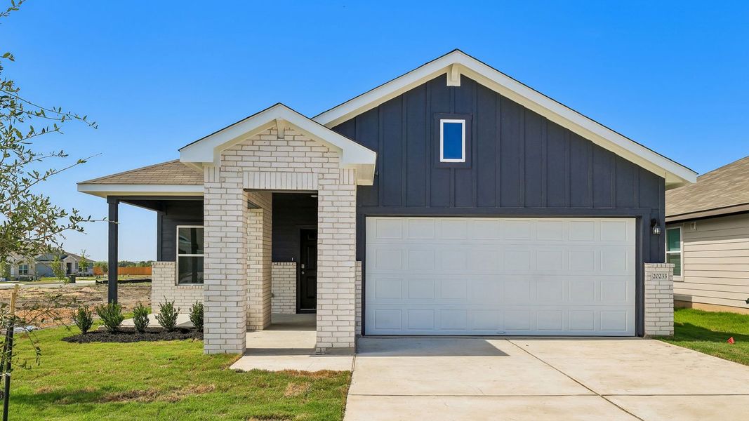 Representative exterior photo of a completed home built from the The Roosevelt by D.R. Horton in Carillon, Manor, TX (Image 2). Representative exterior photo of a completed home built from the The Roosevelt by D.R. Horton in Carillon, Manor, TX (Image 2).