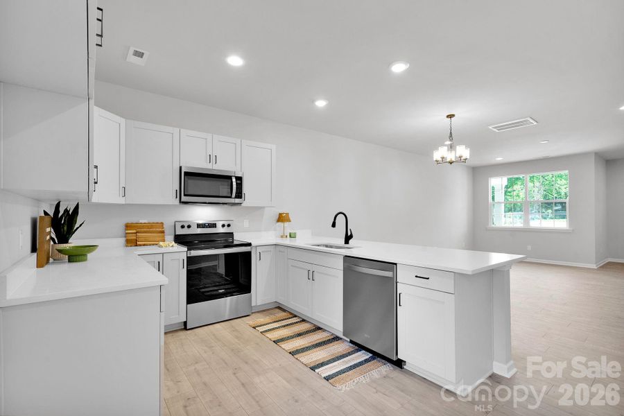 Furnished interior view inside a new home in , Concord (Image 12).