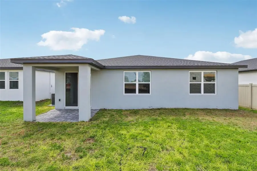 Exterior details and patio area of a home in Crosswinds - Signature Series, Haines City (Image 4).