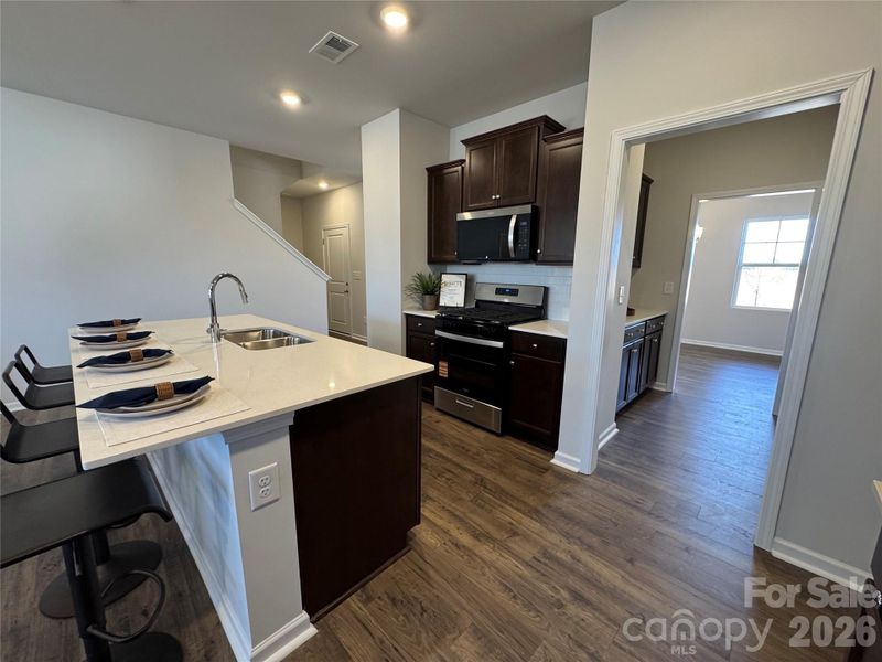 Furnished interior view inside a new home in McFarland Estates, York (Image 15).