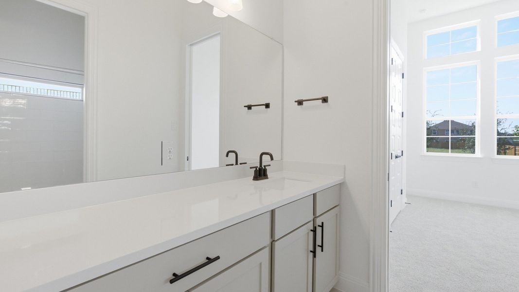 Furnished interior view inside a new home in Oaks at San Gabriel, Georgetown (Image 14).