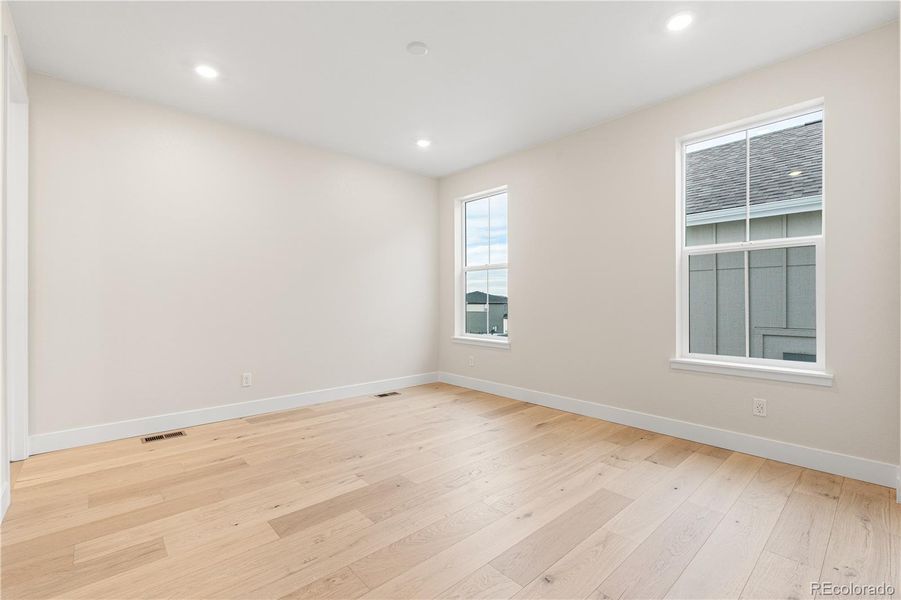 Spacious, unfurnished interior of a new home in Luxe at The Canyons, Castle Pines (Image 46).