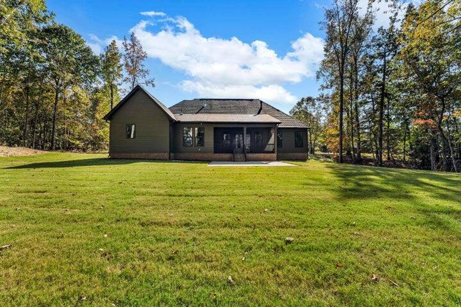Exterior details and patio area of a home in , Ridgeville (Image 3).