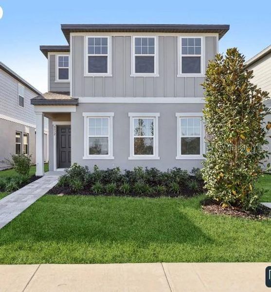 Front exterior of a new home in , Kissimmee, FL, highlighting curb appeal (Image 1). Front exterior of a new home in , Kissimmee, FL, highlighting curb appeal (Image 1).