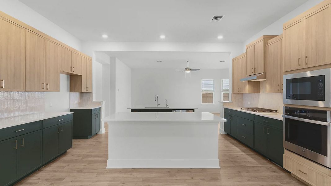Representative furnished interior of a home built from the Archer by Chesmar Homes in Santa Rita Ranch, Liberty Hill (Image 8).