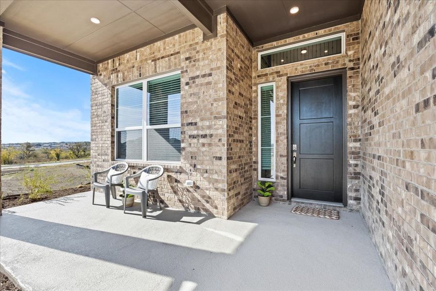 Exterior details and patio area of a home in Sunfield, Buda (Image 24).