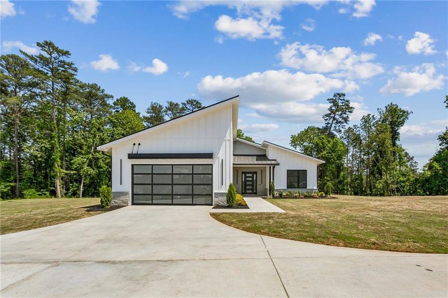 Front exterior of a new home in , Marietta, GA, highlighting curb appeal (Image 26).