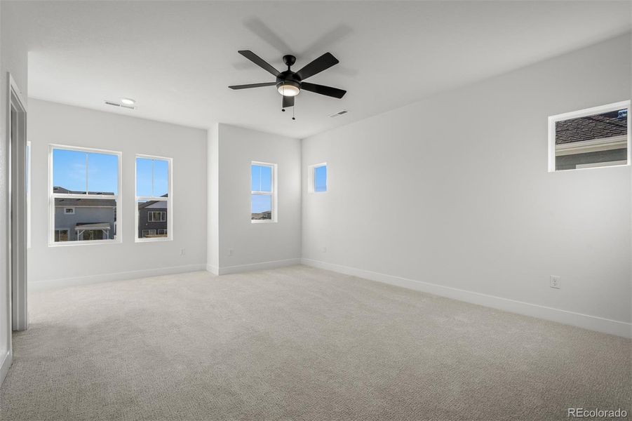 Spacious, unfurnished interior of a new home in Revel Crossing at Wolf Ranch – The Outlook Collection, Colorado Springs (Image 24).