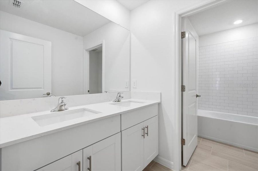 Furnished interior view inside a new home in Two Rivers: The Manors II, Zephyrhills (Image 10). Furnished interior view inside a new home in Two Rivers: The Manors II, Zephyrhills (Image 10).