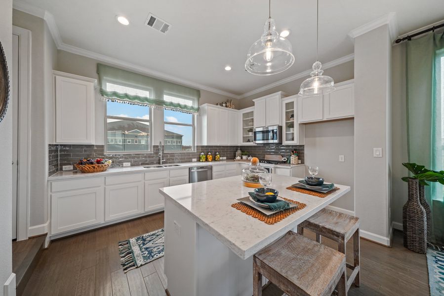 Gourmet Kitchen with island and pendant lighting