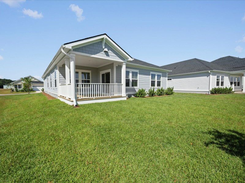 Exterior details and patio area of a home in The Coves at Lakes of Cane Bay, Summerville (Image 26).