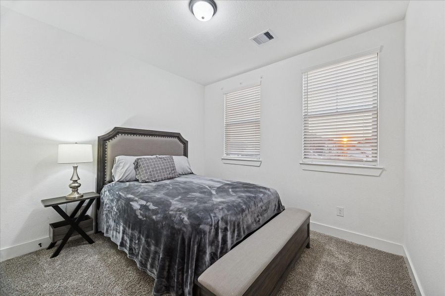 Furnished interior view inside a new home in , Conroe (Image 7).