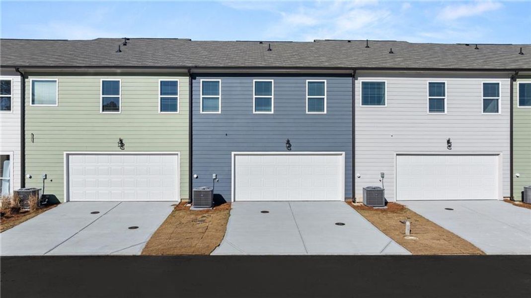 Front exterior of a new home in Lake Carlton, Loganville, GA, highlighting curb appeal (Image 17).