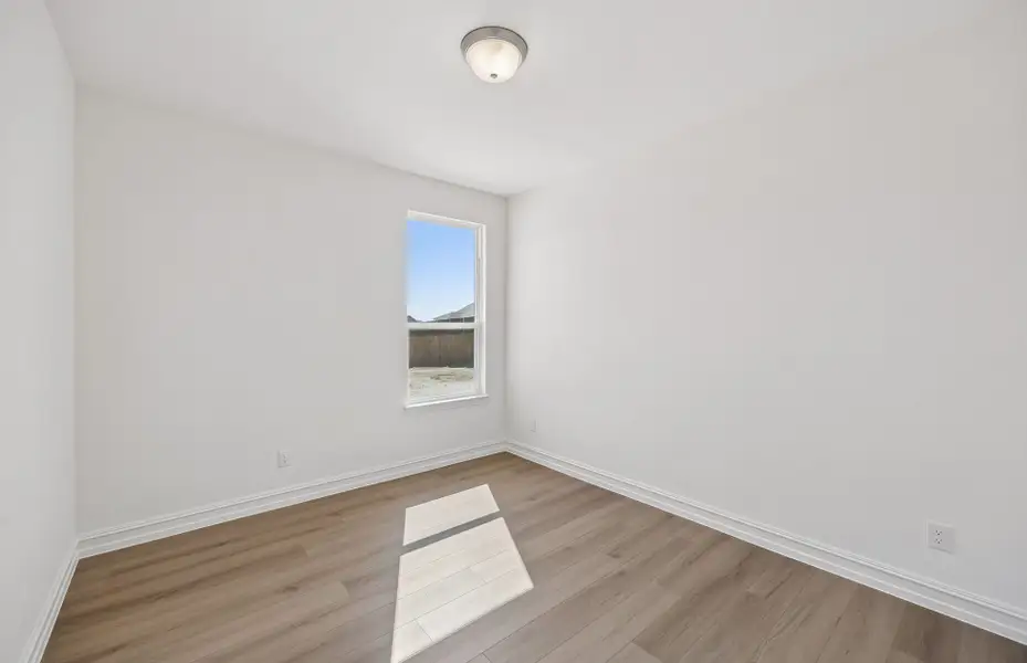 Spacious, unfurnished interior of a new home in Rosemary Fields, Godley (Image 12).
