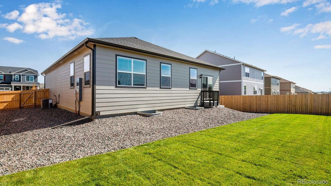 Exterior details and patio area of a home in Timberleaf, Thornton (Image 22).