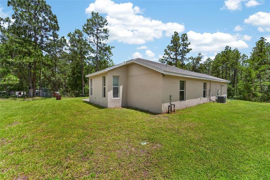 Exterior details and patio area of a home in , Brooksville (Image 4).