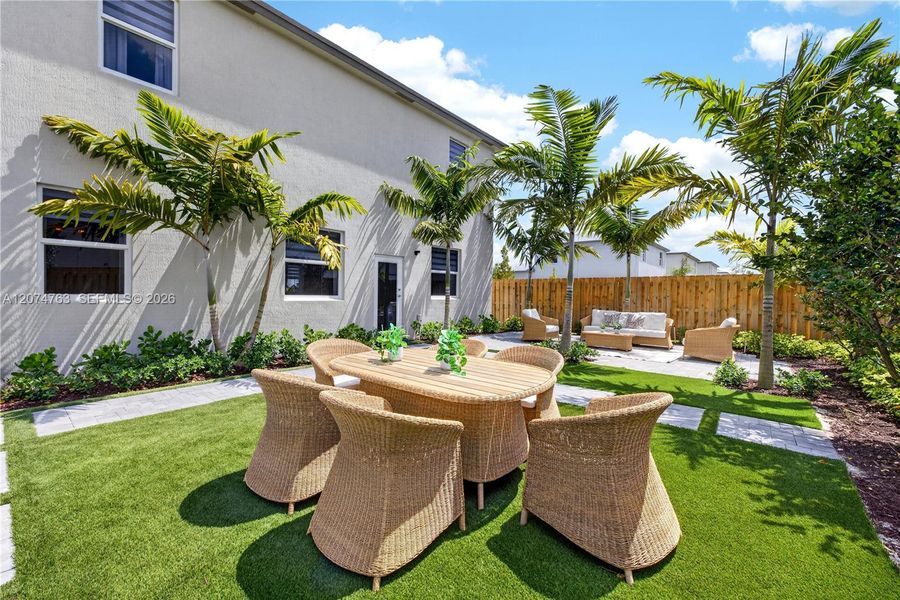 Exterior details and patio area of a home in Acacia Groves, Miami (Image 3).