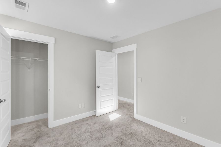 Spacious, unfurnished interior of a new home in Pineland Preserve, Summerville (Image 47).