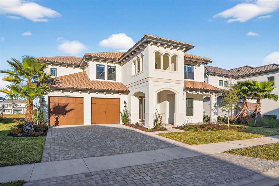 Front exterior of a new home in , Wesley Chapel, FL, highlighting curb appeal (Image 28).