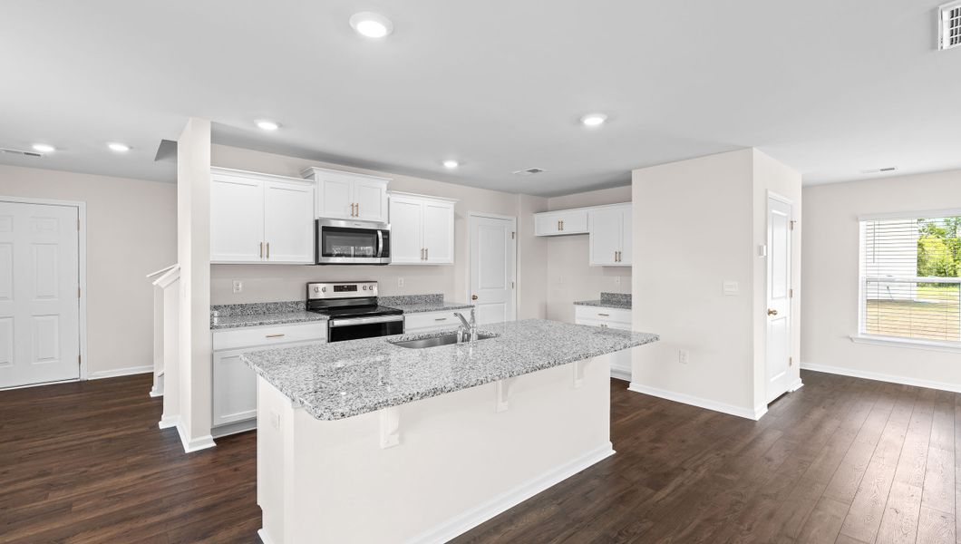 Representative furnished interior of a home built from the ELSTON by D.R. Horton in Harrier Point, Woodruff (Image 6).