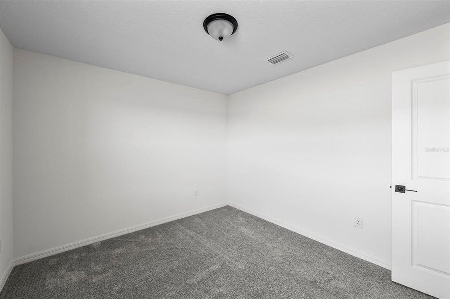 Spacious, unfurnished interior of a new home in Heron Bay, Palmetto (Image 19). Spacious, unfurnished interior of a new home in Heron Bay, Palmetto (Image 19).