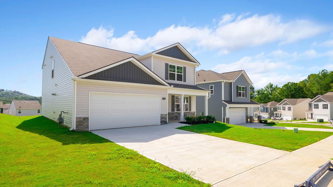 Front exterior of a new home in Hawk's Ridge, Rossville, GA, highlighting curb appeal (Image 4).