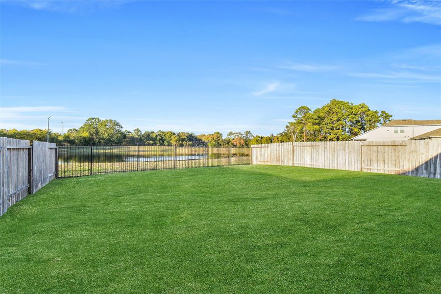 Exterior details and patio area of a home in Summerwood Trails, Willis (Image 3). Exterior details and patio area of a home in Summerwood Trails, Willis (Image 3).