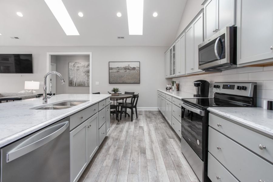 Representative furnished interior of a home built from the Manhattan by Keystone Homes NC in Weybridge, Burlington (Image 26).