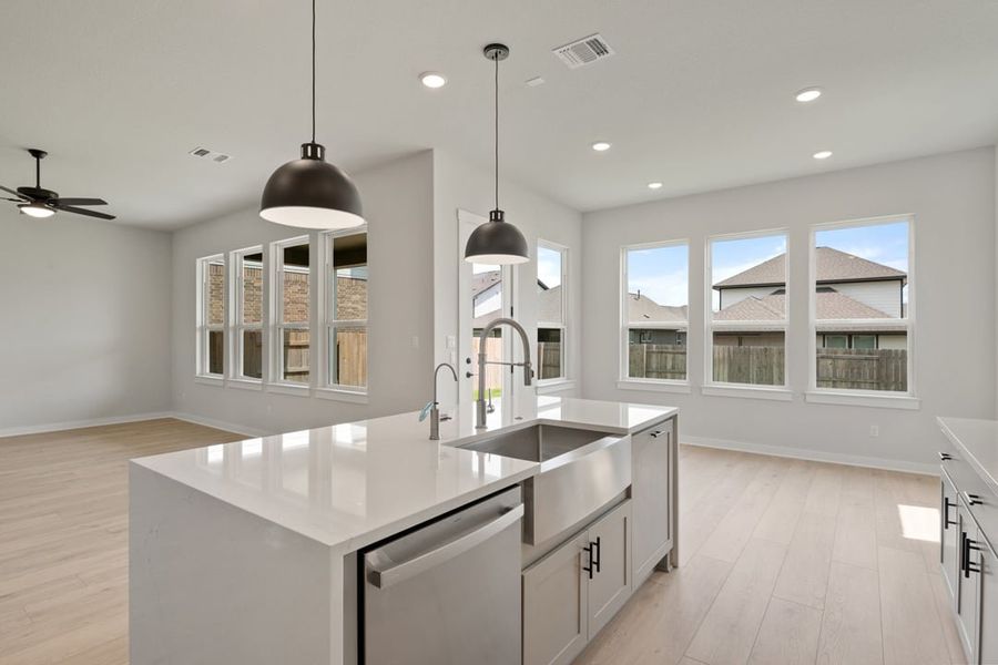 Furnished interior view inside a new home in Arbor Collection at Lariat, Liberty Hill (Image 10). Furnished interior view inside a new home in Arbor Collection at Lariat, Liberty Hill (Image 10).