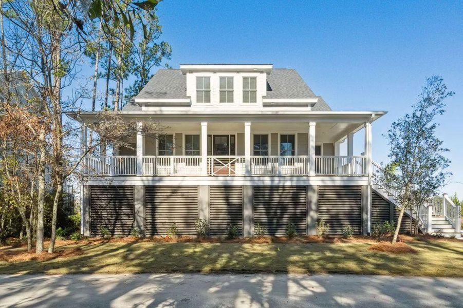 Front exterior of a new home in Kings River Preserve, Hollywood, SC, highlighting curb appeal (Image 2). Front exterior of a new home in Kings River Preserve, Hollywood, SC, highlighting curb appeal (Image 2).